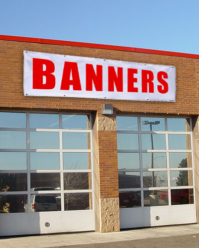 Photo of a banner sign placed on a light post.